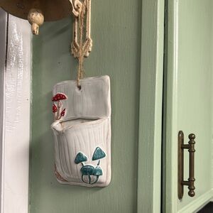 Handcrafted mushroom Ceramic Hanging Pocket with Mushroom Motif